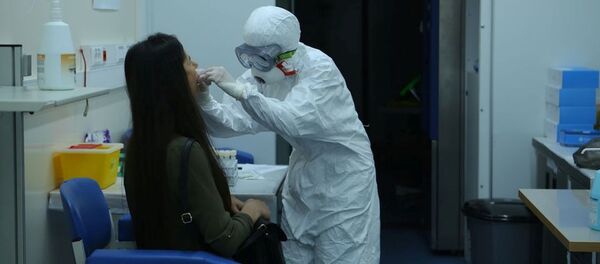 Тест на короновирус в Госпитале Таможенного Комитета, фото из архива Тест на короновирус в Госпитале Таможенного Комитета, фото из архива - Sputnik Азербайджан