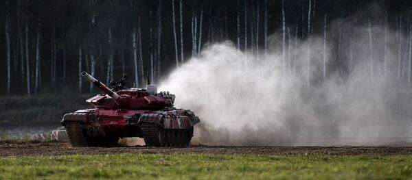 Танк Т-72Б3 команды военнослужащих Азербайджана во время соревнований танковых экипажей Танк Т-72Б3 команды военнослужащих Азербайджана во время соревнований танковых экипажей - Sputnik Азербайджан