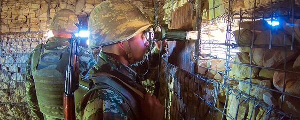 Азербайджанский военнослужащий на боевой позиции, фото из архива - Sputnik Азербайджан