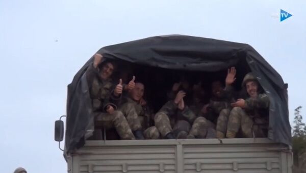 Первые кадры азербайджанских солдат на освобожденных территориях - Sputnik Азербайджан