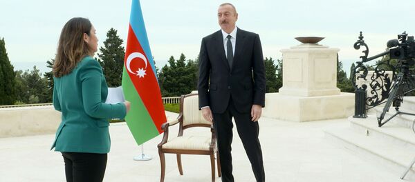 Президент Азербайджана Ильхам Алиев во время интервью телеканалу «Аль-Джазира» Президент Азербайджана Ильхам Алиев во время интервью телеканалу «Аль-Джазира» - Sputnik Азербайджан