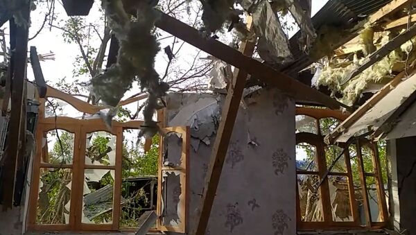 Семьи в Агдамском районе остались без крова – видео разбомбленных домов - Sputnik Азербайджан