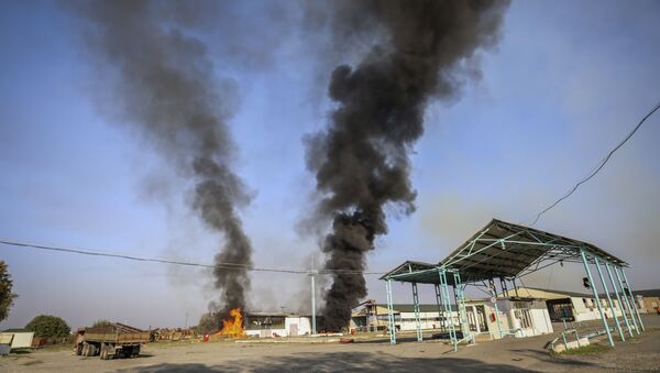 Пожар на заводе после обстрела ВС Армении в Тертере - Sputnik Azərbaycan