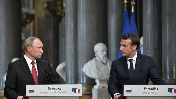 Президент РФ Владимир Путин и президент Франции Эммануэль Макрон, фото из архива - Sputnik Азербайджан
