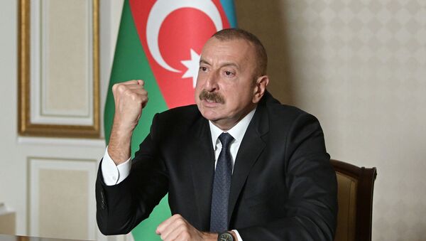 Президент Ильхам Алиев во время обращении к наци - Sputnik Азербайджан