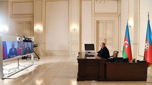 Президент Азербайджана Ильхам Алиев и Президент России Владимир Путин встретились в формате видеоконференции - Sputnik Азербайджан