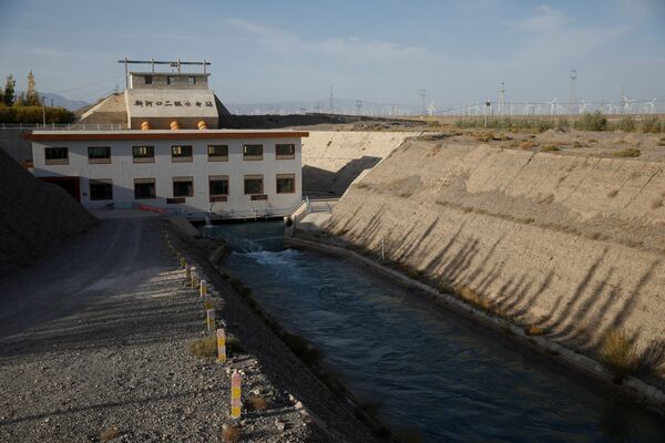Гидроэлектростанция на реке Чангма на окраине города Юмэнь, провинция Ганьсу, Китай - Sputnik Азербайджан