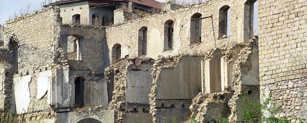 Разрушенные дома в городе Шуша, фото из архива - Sputnik Азербайджан