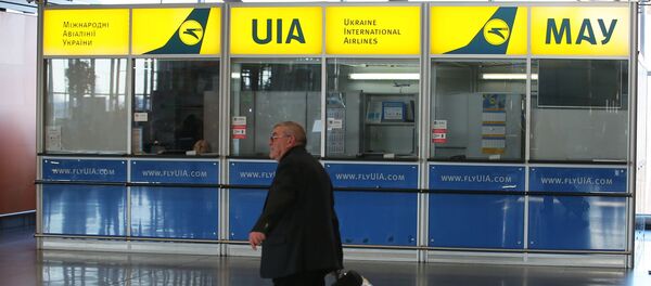 Информационно-сервисный центр авиакомпании Международные авиалинии Украины в международном аэропорту Борисполь в Киеве Информационно-сервисный центр авиакомпании Международные авиалинии Украины в международном аэропорту Борисполь в Киеве - Sputnik Азербайджан