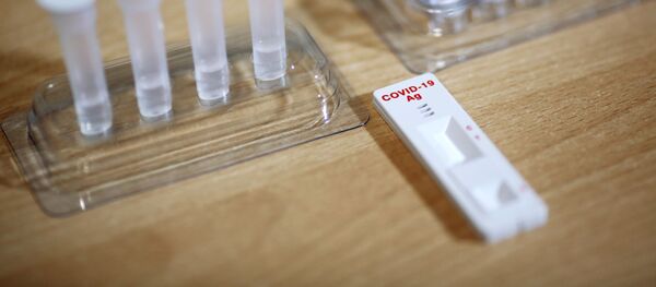 Экспресс-тест на COVID-19, фото из архива Экспресс-тест на COVID-19, фото из архива - Sputnik Азербайджан