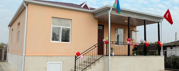 Дом построенный для семей шехидов Дом построенный для семей шехидов - Sputnik Азербайджан
