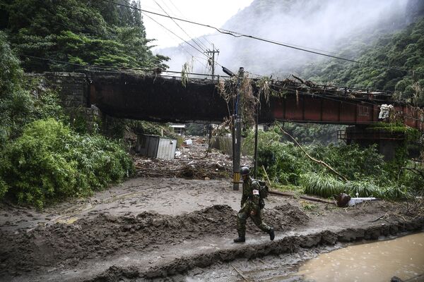Последствия проливных дождей, разрушительных наводнений и оползней, в результате которых погибло не менее 52 человек, в японской префектуре Кумамото - Sputnik Azərbaycan