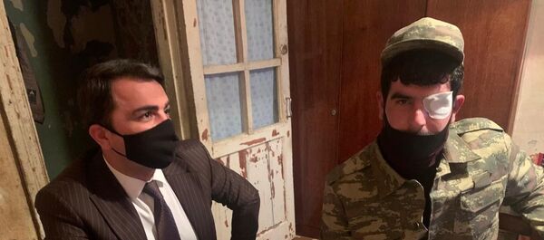 Представитель Минтруда в доме ветерана Эльнура Ханкшиева Представитель Минтруда в доме ветерана Эльнура Ханкшиева - Sputnik Азербайджан