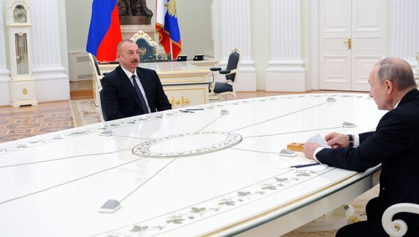 Президент РФ Владимир Путин и президент Азербайджана Ильхам Алиев во время трёхсторонних переговоров по поводу ситуации в Нагорном Карабахе - Sputnik Azərbaycan