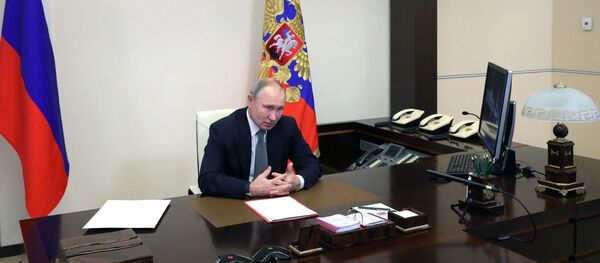 15 января 2021. Президент РФ Владимир Путин проводит оперативное совещание с постоянными членами Совета безопасности РФ в режиме видеоконференции. - Sputnik Азербайджан