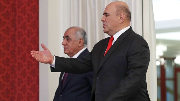 Председатель правительства РФ Михаил Мишустин и премьер-министр Азербайджана Али Асадов (слева) во время встречи, 20 мая 2021 - Sputnik Азербайджан