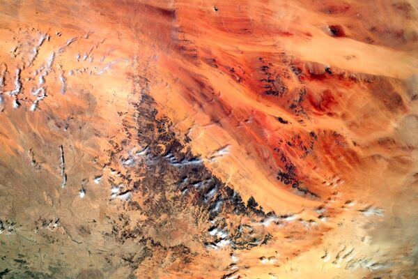Вид из космоса на геологическое образование «Око Сахары», расположенное в Западной Африке - Sputnik Азербайджан
