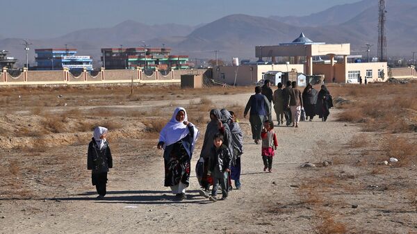 Беженцы из провинции Газни в Афганистане - Sputnik Азербайджан