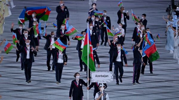 Проход азербайджанской делегации на церемонии открытия 32-летних Олимпийских игр в Токио, фото из архива - Sputnik Азербайджан