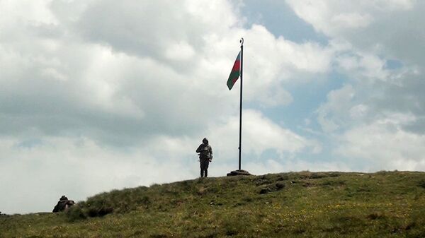 Азербайджанский военнослужащий на боевой позиции, фото из архива  - Sputnik Азербайджан