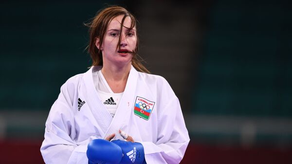Азербайджанская каратистка Ирина Зарецкая во время выступления на Олимпийских играх в Токио - Sputnik Азербайджан