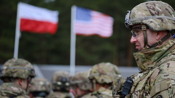 Церемония приветствия многонационального батальона НАТО под руководством США в польском Ожише. - Sputnik Azərbaycan