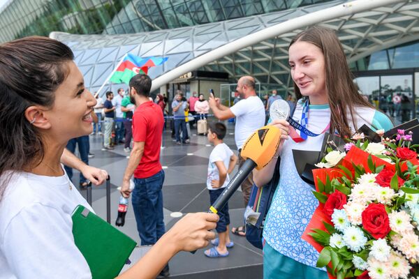 Встреча олимпийской сборной Азербайджана в аэропорту Гейдар Алиев в Баку. - Sputnik Азербайджан