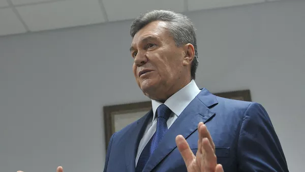 Бывший президент Украины Виктор Янукович, прибывший в Ростовский областной суд  - Sputnik Азербайджан