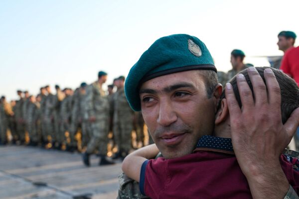 Азербайджанские миротворцы, выполнявшие свои служебные обязанности в Афганистане, были выведены из этой страны и вернулись на родину. - Sputnik Азербайджан