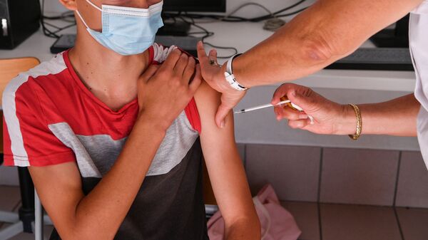 Вакцинация ребенка от коронавируса, фото из архива - Sputnik Азербайджан