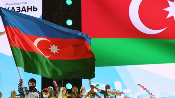 Спортсмен с флагом Азербайджана, фото из архива - Sputnik Азербайджан
