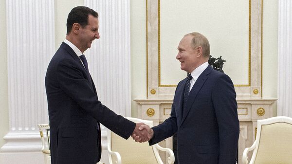 13 сентября 2021. Президент РФ Владимир Путин и президент Сирии Башар Асад (слева) во время встреч - Sputnik Азербайджан