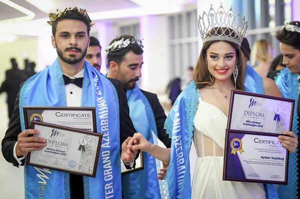 Miss Grand Azerbaijan-2021 Айдан Йешилдаг и Mister Grand Azerbaijan Хагани Гусейнов - Sputnik Азербайджан