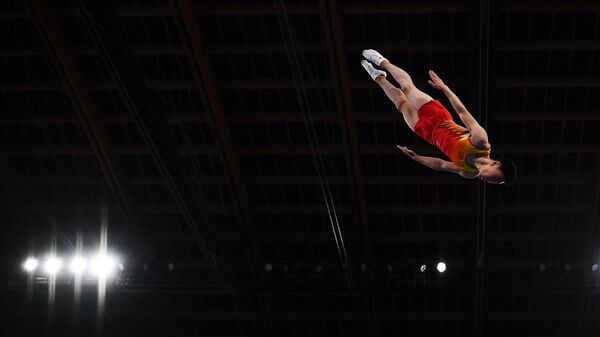 Спортсменка во время соревнований по прыжкам на батуте, фото из архива - Sputnik Azərbaycan