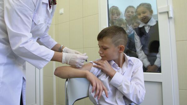Вакцинация ребенка против гриппа - Sputnik Азербайджан