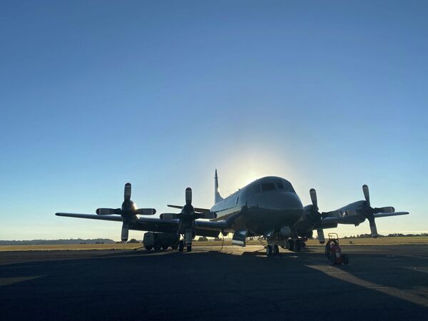 Самолет Orion ВВС Новой Зеландии готовится покинуть базу Окленд и отправиться в Тонгу. - Sputnik Азербайджан