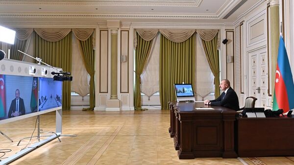 резидент Азербайджана Ильхам Алиев в понедельник, 17 января, провел встречу с председателем парламента Черногории Алексой Бечичем в видеоформате - Sputnik Азербайджан