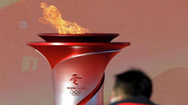 Эстафета олимпийского огня зимних Игр 2022 года в Пекине - Sputnik Азербайджан
