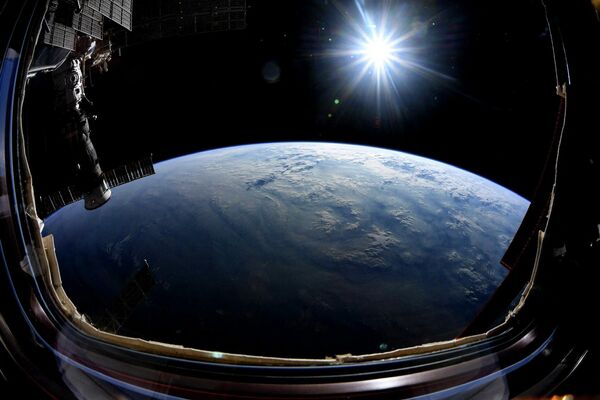Вид на Землю с МКС. Фотография астронавта Ника Хейга. - Sputnik Азербайджан
