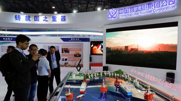 Стенд китайской национальной ядерной корпорации на выставке в Пекине - Sputnik Азербайджан