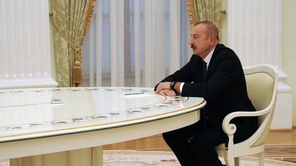Президент Азербайджана Ильхам Алиев во время встречи с президентом РФ Владимиром Путиным в Кремле - Sputnik Азербайджан