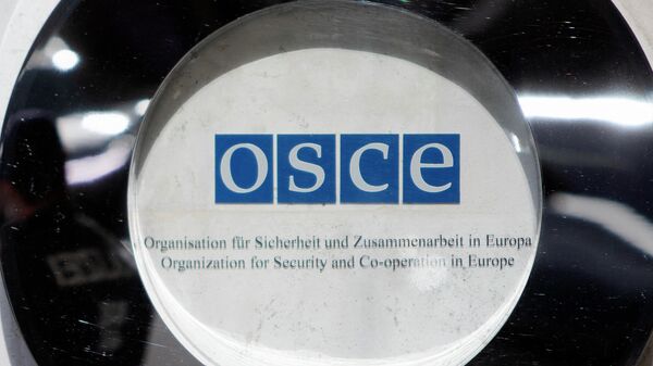 Логотип ОБСЕ (Организация по безопасности и сотрудничеству в Европе), фото из архива - Sputnik Azərbaycan