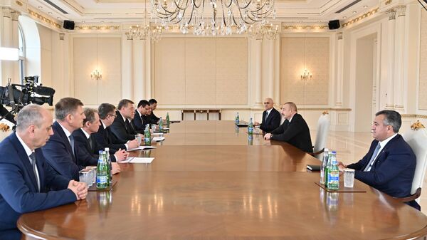 Президент Ильхам Алиев принял делегацию во главе с губернатором Астраханской области России - Sputnik Азербайджан