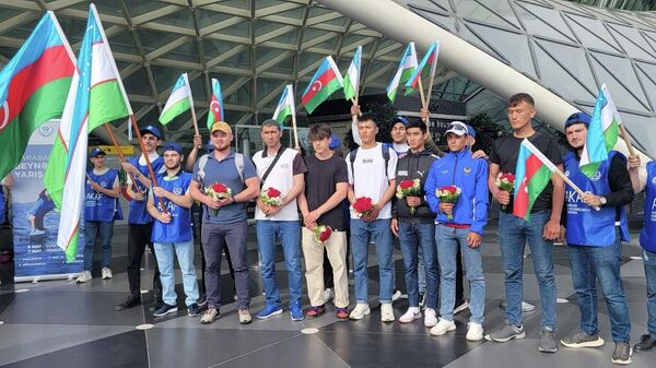 В Баку прибыли первые участники гребной регаты в Суговушане - Sputnik Азербайджан