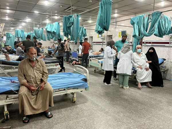 В больницах сотни людей с приступами удушья. - Sputnik Азербайджан