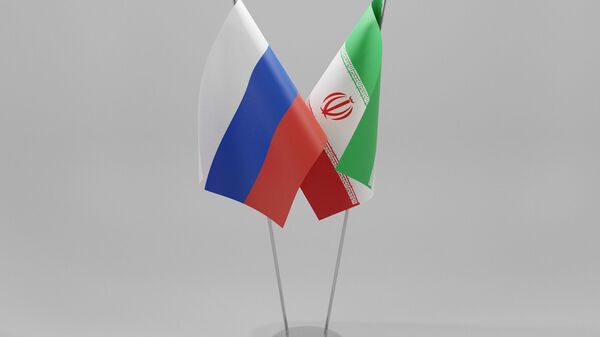 İran və Rusiuya bayraqları, arxiv şəkli - Sputnik Azərbaycan