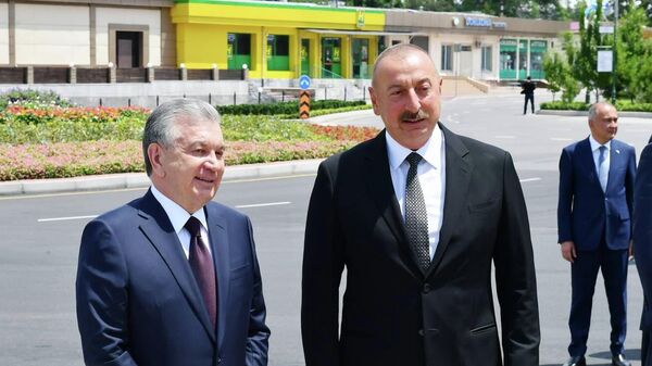 Президент Азербайджана Ильхам Алиев и Президент Узбекистана Шавкат Мирзиёев, фото из архива - Sputnik Азербайджан