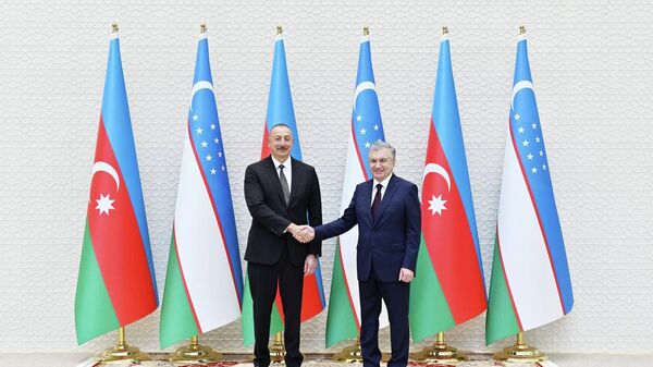 Президент Азербайджана Ильхам Алиев и Президент Узбекистана Шавкат Мирзиёев - Sputnik Азербайджан
