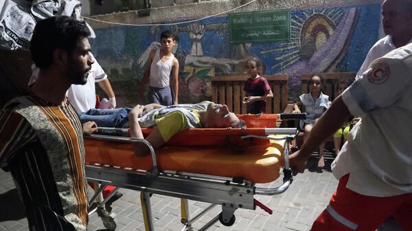 Жертвы после ударов Израиля по Газе  - Sputnik Азербайджан