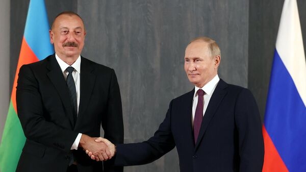 Ильхам Алиев и Владимир Путин, фото из архива - Sputnik Азербайджан